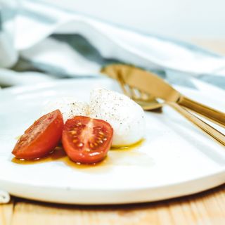 Egg and tomatoes on a plate